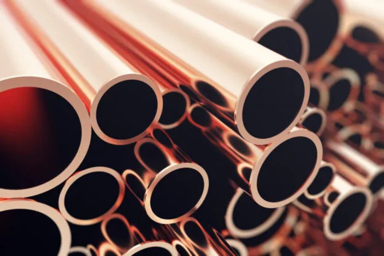 Group of coiled copper pipes and tubing.